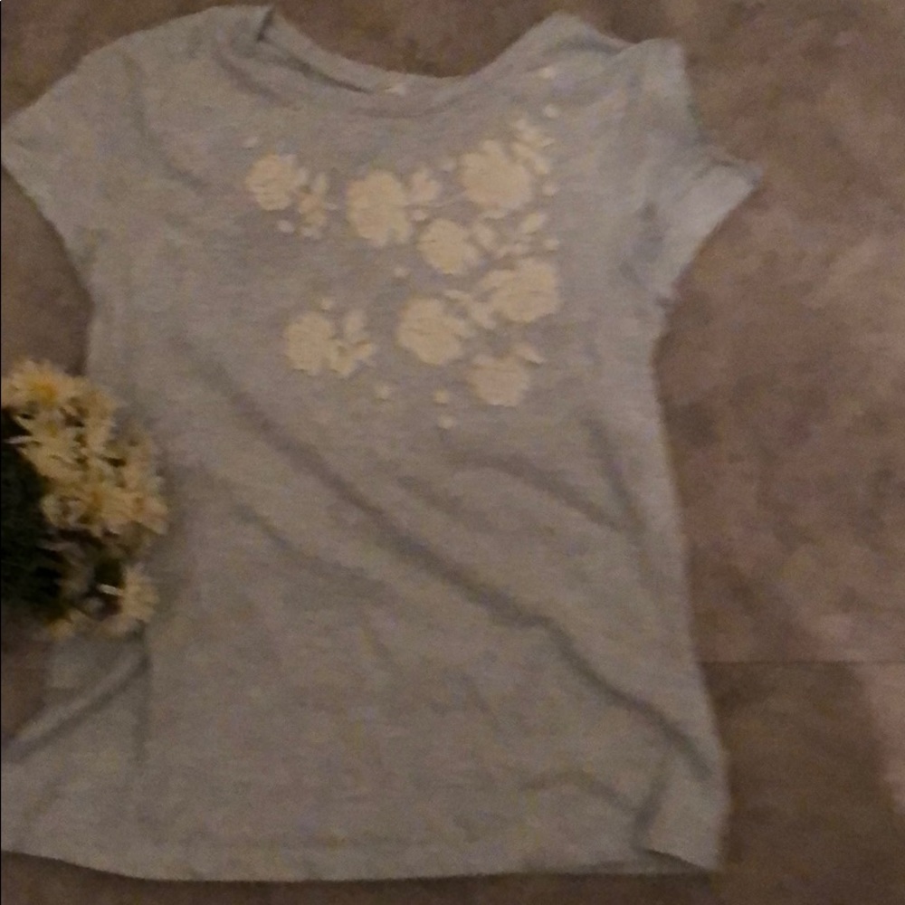 Light blue gap kids top has slits